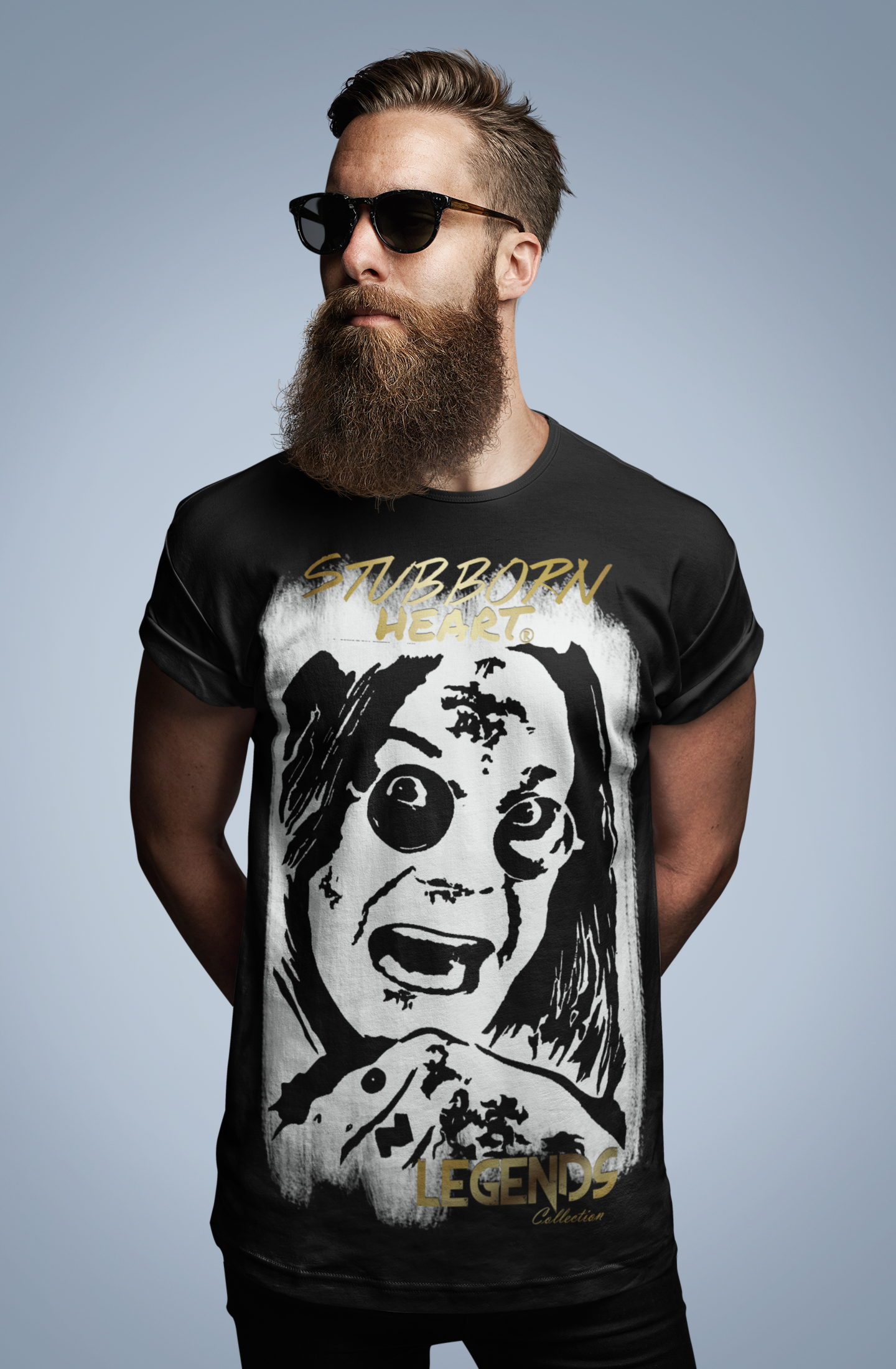 OZZY OSBOURNE inspired T-Shirt on the LEGENDS COLLECTION: by designer STUBBORN HEART Apparel. Large full front handdrawn black & white portrait of the Black Sabbath singer.